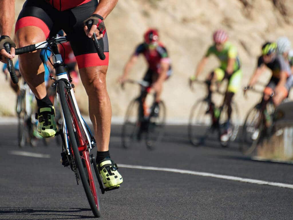 Rennrad Fahrrad bergauf Belastung für Beinmuskulatur
